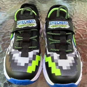 Brand new Skechers air cooled memory foam boys sneakers. Size 1